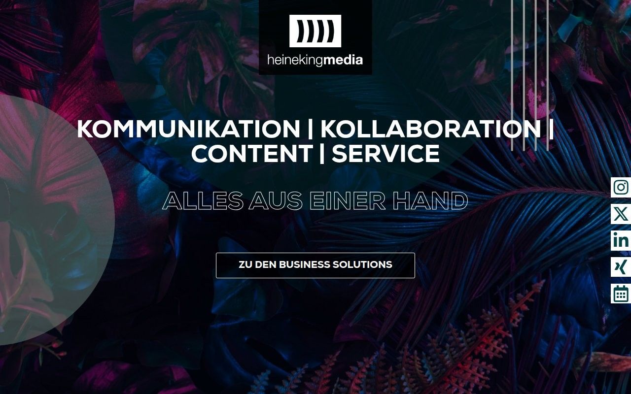 Heinekingmedia German homepage hero with a communication and collaboration tagline over dark tropical leaves